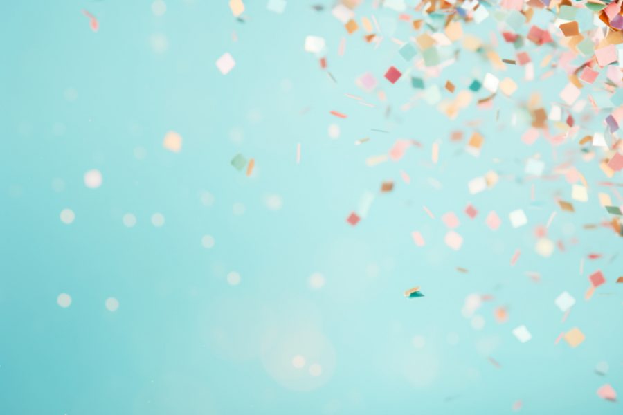 Confetti tossed into the air mid-celebration.